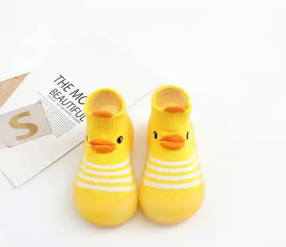 Imagen de Zapatos de bebé tipo calcetín con suela de goma