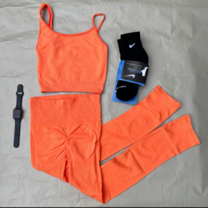 Imagen de Ropa Deportiva Color naranja, textura licra